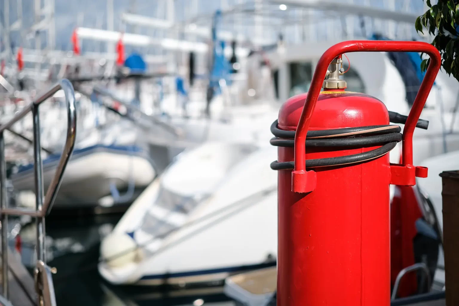 fire-extinguisher-closeup-mooring-yacht-club-blurred-background-providing-fire-protection-safety-prevention